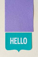 tag with the word hello and blank paper