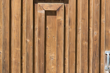 old wooden door with metal handle