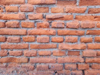 Red brick wall. Texture of old dark brown and red brick wall panoramic backgorund.