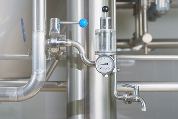 Pressure measuring device in a brewery with industrial stainless steel pipes