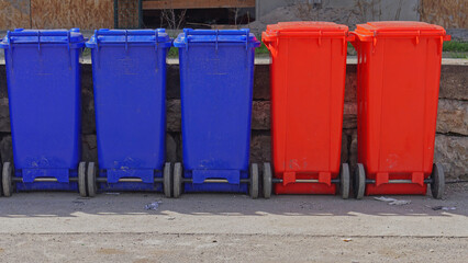 Fototapeta na wymiar Plastic wheelie bins