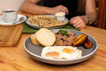 Gallo pinto costa rica traditional breakfast with black coffee and tortillas