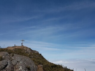 Fototapeta premium person on top of mountain