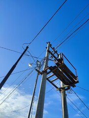 power lines on a blue sky