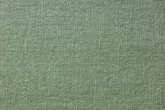 green linen fabric texture background. high resolution textured pattern.