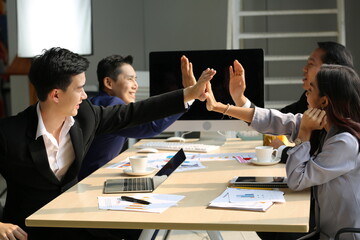 Businessman Giving Speech On Business Meeting With Colleagues, Discussing Work Ideas And Projects, Making Presentation Standing In Modern Office. Teamwork, Entrepreneurship, Corporate Meeting