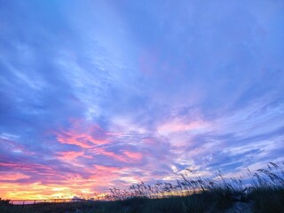 Colorful Beach Cloudscape Over Seagrass