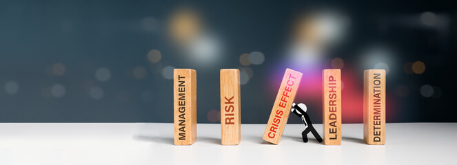 A businessman halts the falling domino notion. Crisis, risk, management, leadership, and determination are all represented by this symbol.