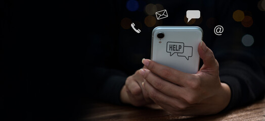 A business woman indicates an operator's emblem, which includes iconography for after-sales services. Customer satisfaction communication channel, wifi, masage, phone,web.