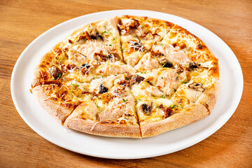 pizza with mushroom on the white plate
