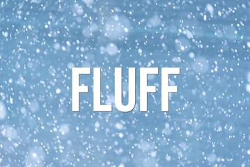 FLUFF - word on the background of the sky with clouds.