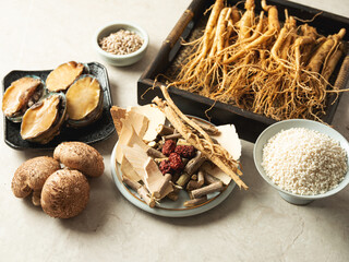 Samgyetang ingredients, fresh raw chicken and herbal medicines
