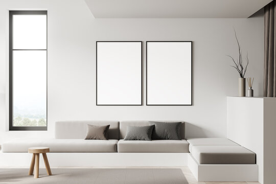 Light cozy room interior with couch and panoramic window. Mockup frames
