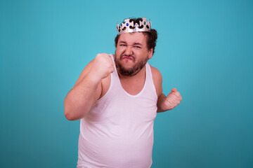 Funny man in a silver crown.	