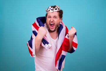 Funny man in a silver crown.	