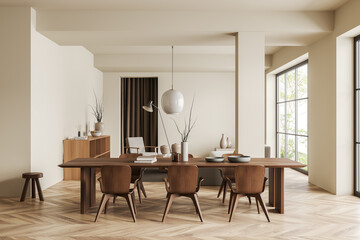 Light living room interior with dining table and relax area, panoramic window