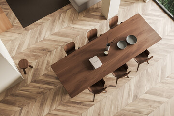 Top view on bright dining room interior with dinner table