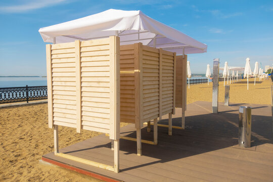 A changing booth on the beach early in the morning.