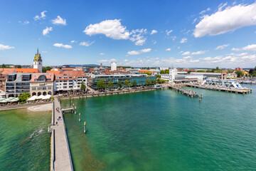 Fototapeta na wymiar Friedrichshafen waterfront with port harbor at lake Constance Bodensee travel traveling from above in Germany