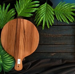 christmas tree with leaves on wooden background