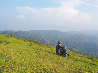 Fototapeta premium Trekking solo backpack on mountain trail in tropical forest at Tak Province, Thailand.