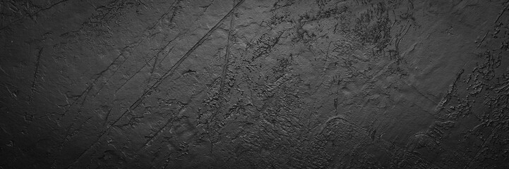 Black stone concrete background. Top view.