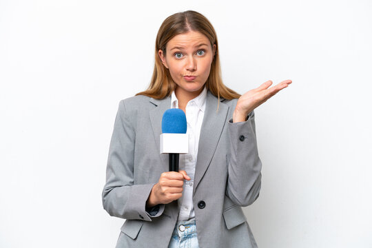 Young caucasian tv presenter woman isolated on white background having doubts while raising hands