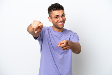 Young caucasian Brazilian man isolated on white background pointing front with happy expression