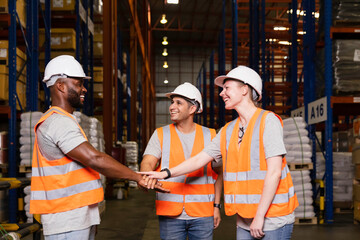 Group worker in safety hat hands together happy celebrate success at warehouse, Logistic inventory teamwork concept