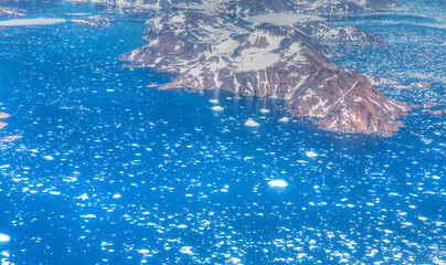 View from airplane of melting polar ice cap Greenland - Greenland
