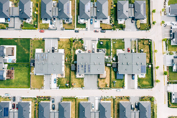 Houses aerial birds eye view. Aerial view of a typical suburb in Poland. Modern architecture and design. 