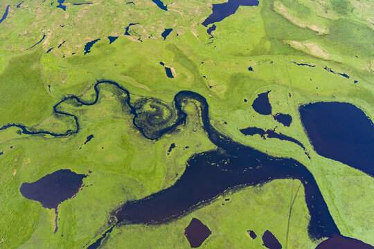 river top view shooting from a drone . river on a green background. amur river bird's-eye view 