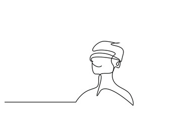 a young boy wears reality glasses and watches something and laughs having fun