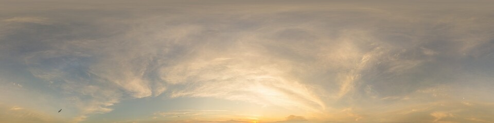 Obraz premium Bright sunset sky panorama with Cirrus clouds. Hdr seamless spherical equirectangular 360 panorama. Sky dome or zenith for 3D visualization, game and sky replacement for aerial drone 360 panoramas.