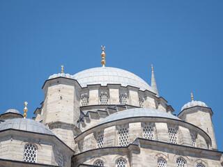 Mosque in Istanbul against blue sky