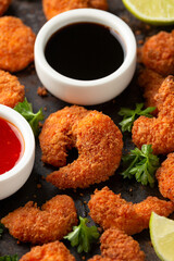Crispy Prawns in breadcrumbs. Served with soy and sweet chilli sauce