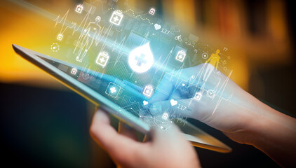 Close-up of a touchscreen with healthcare icons