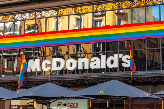 McDonalds decorated in the gay pride party Madrid in the gran via, with the colors of the rainbow