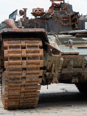 Destroyed Russian tank. Rusty armor of military equipment. Military conflict in Ukraine 2022