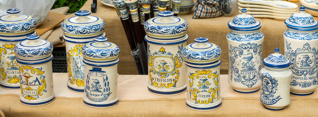 Fototapeta premium Ancient ceramic jars for the preservation of medicinal herbs in pharmacies