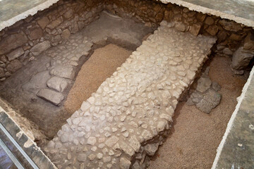Partially preserved ancient stonework under a residential building in the Arab Christian village Miilya, in the Galilee, in northern Israel