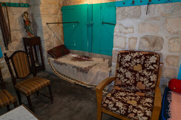 Antique tools and furniture from the 19th and early 20th centuries on display in a residential building in the Arab Christian village Miilya, in the Galilee, in northern Israel