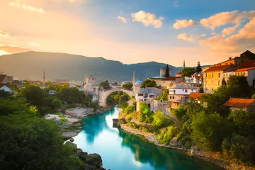 Papier Peint photo Stari Most Mostar, Bosnia and Herzegovina. The Old Bridge, Stari Most, with emerald river Neretva
