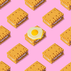 Creative concept of cookies and one fried egg. Minimalism. collage art. Seamless pattern.
