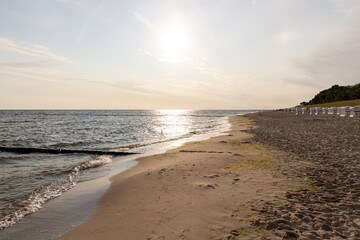 The view of the beach of Zempin on the island of Usedom with many beach chairs