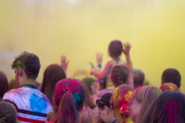 Holi festival . multicolored paints in a crowd of people