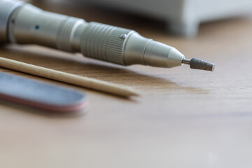Naklejka premium Manicure nail tool, cutter for manicure or fraser. Selective focus.