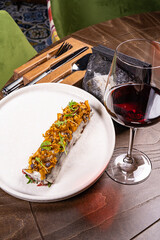 warm beef carpaccio with rosemary and red wine