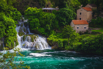 Fototapeta na wymiar Beautiful waterfall in the green forest, Krka National Park, Croatia