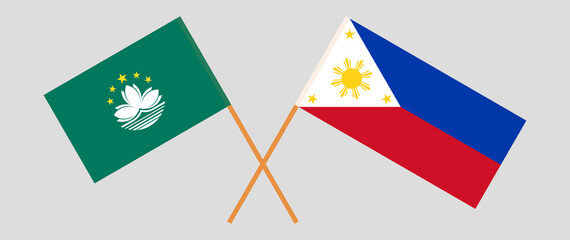 Crossed flags of Macau and the Philippines. Official colors. Correct proportion